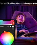 Child in a chair with smartphone app controlling 2 Pack Premium Smart Light Starter Kit With 16 Million Colors For Most Lamps And Ceiling Lights That Plays Nice With Alexa Apple HomeKit And Google Assistant So You Can Dial In The Perfect Vibe From Anywhere visible on screen