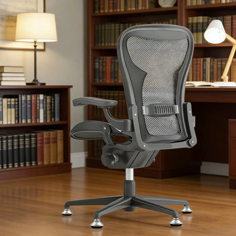 Ditch Those Dang Office Chair Casters With This 5 Pack Of Low Profile Bell Glides on a modern ergonomic chair in a library.
