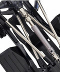 Close-up of One Tenth Scale RC Crawler Chassis Kit With 313mm Wheelbase, visible nylon frame, and metal axles.