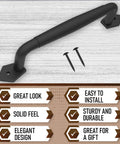 10 Inch Round Rustic Barn Door Handle In Black Steel Versatile Pull For Sliding Doors with two screws shown on wood surface