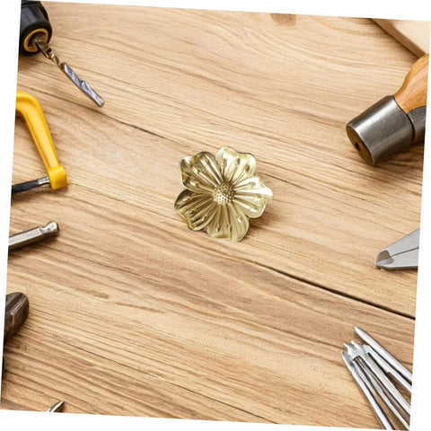 Vintage Brass Flower Cabinet Handle Single Hole Drawer Pull For Wardrobe And Cupboard Doors shown with tools