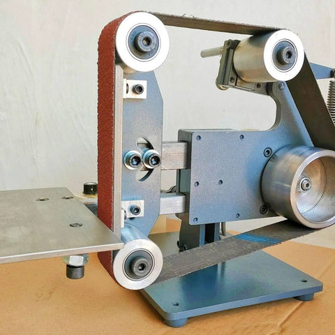 Top Tier Heavy Duty Bench Polisher 1100W Variable Speed Grinder And Belt Sander Station with a close-up view of sanding mechanism.