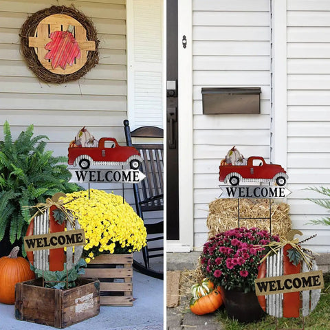 Red Pickup Truck Welcome Sign With Pumpkin Interchangeable Seasonal Yard Stake in garden, showcasing fall decor with flowers and pumpkins