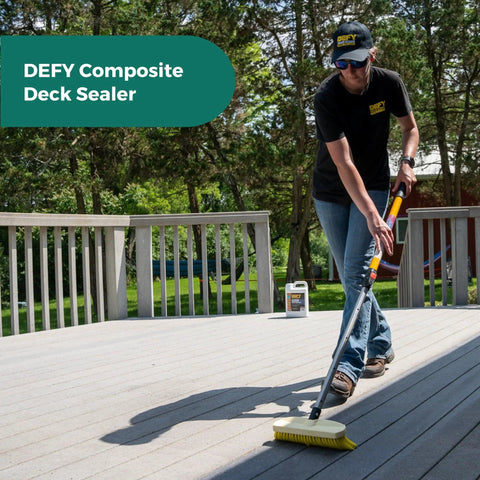 Person applying Extreme Composite Deck Sealer Crystal Clear Waterproof Sealant For Wood And Composite Surfaces With Zinc Nano Technology