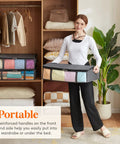 Woman holding Under Bed Storage Bags 40L Set Of 3 With Front Clear Window Foldable Closet Organizers in gray breathable fabric