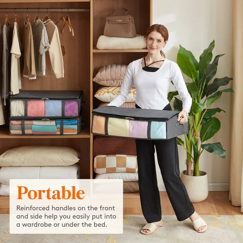 Woman holding Under Bed Storage Bags 40L Set Of 3 With Front Clear Window Foldable Closet Organizers in gray breathable fabric