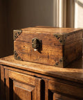 Wooden box with Antique Bronze Metal Corner Protectors Set Of 8 Decorative Brackets for wood furniture, showcasing rustic design.