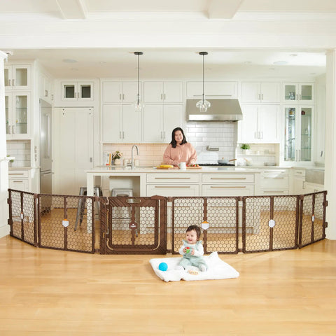 192-Inch Ultra Wide 2-In-1 Baby Gate And Play Yard With Door, Adjustable 6-Panel Plastic Safety Gate, brown, in kitchen