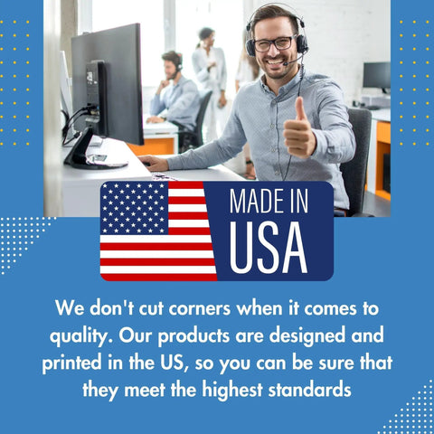 Smiling man in office with 'Made in USA' badge, emphasizing quality and US-based production for Custom Vinyl Banner Printing.