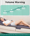 Woman using full body massage mat with heat and 10 vibrating motors memory foam pad for back pain relief on sofa.
