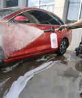 High Power Pressure Washer Gun With Adjustable Pressure cleaning red car with foam, showcasing 5 Nozzle Tips and 5000 PSI performance