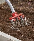 Disc Cultivator Heavy Duty Garden Tool With ComfortGEL Grip adjustable six and a half inch metal tines in raised bed.