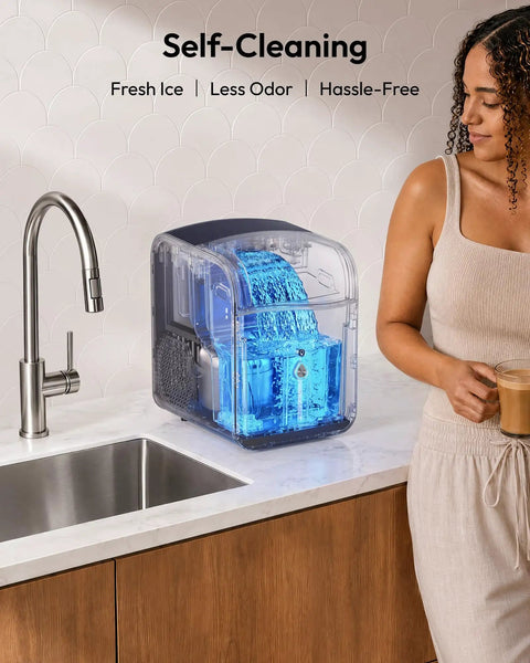 Fresh Freeze Countertop Nugget Ice Maker Yields 42 Lbs Soft Sonic Pebble Ice In Minutes With Smart App Alexa Hookup Self Cleaning, displayed in a kitchen with water flow.