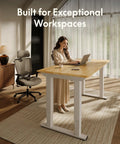 Premium Four Leg Height Adjustable Standing Desk With Natural Maple Surface And Rock Solid Anti Wobble Engineering For No Stress Home Office And Multi Monitor Setups in a modern workspace