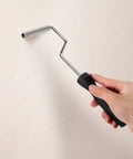 Hand holding Paddle Tool For Fiberglass Laminating Bubble Roller With Aluminum Head For Mold Resin Composite 3 Inch