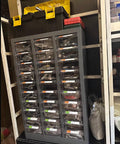Rock Solid Storage Cabinet Featuring Super Smooth Sliding Rails For Stress Free Bolt Nut Screw Sorting And Quick Sample Access Keeping Workshops Totally Organized with multiple clear drawers.