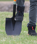 Heavy Duty Digging Shovel 41 Inch With Trenching Blade And Comfortable Handle For Garden Landscaping Construction And Masonry A Do It All Shovel For Digging Soil Dirt And Gravel being used on grass