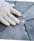 Pro Grade Tile Wedges And Spacers Kit For Quick Ceramic Tile Leveling Reusable PE Material Spacers in use for installation