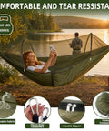 Go To Ultra Lightweight Travel Hammock With Pop Up Bug Net For Backpacking And Camping by a lake during sunset