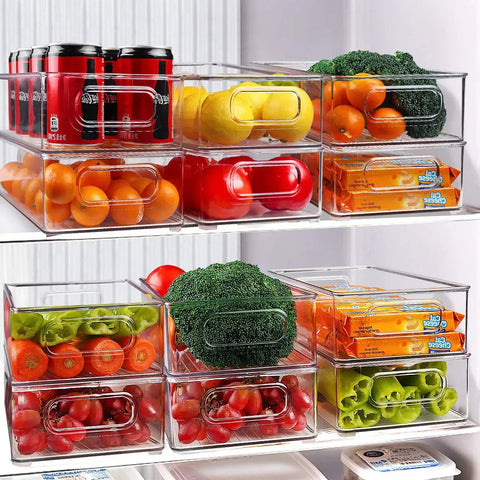 Stackable Fridge Organizer Bins Set Of 6 Clear Kitchen Storage Bins With Easy Grip Handles Includes 20 Plastic Bags For Pantry Cabinets Shelves Drawers And Freezer Food Safe BPA Free 10 Inch Long filled with fruits and cans in a fridge