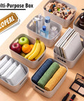 Ten Pack Gray White Plastic Storage Bins With Reinforced Handles For Home Organization And Closet Pantry Use Stackable Small Containers filled with fruits, towels, and toiletries.