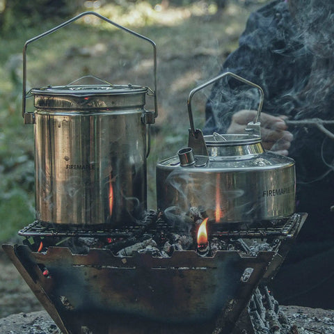 1.2L Stainless Steel Camping Pot with lockable lid for bushcraft and campfire cooking on open fire with kettle.