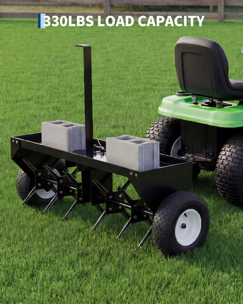 Heavy Duty 48 Inch Tow Behind Plug Lawn Aerator With Universal Hitch Deep Soil Penetration Steel Tines Tray And Inflatable Wheels For Lawns Gardens And Farms Unbreakable Steel Chassis Black attached to a lawn tractor