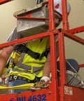 Worker using Adjustable Non-Shock Absorbing Lanyard 4 To 6 Feet Yellow For Fall Protection And Work At Heights on lift