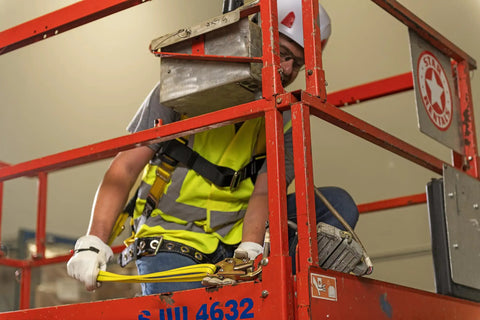 Worker using Adjustable Non-Shock Absorbing Lanyard 4 To 6 Feet Yellow For Fall Protection And Work At Heights on lift