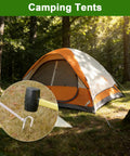 Tough As Nails Heavy Duty 12 Inch J Hook Rebar Stakes, securing a camping tent in forested area with mallet close-up.