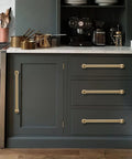 2 Pack 5 Inch Hole Center Brushed Brass Cabinet Pulls Heavy Duty Solid Zinc Alloy Handles installed on kitchen cabinets