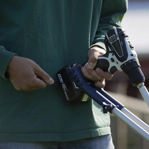 Person holding a Drill Powered Cultivator Attachment For Cordless Drills, Flexible Width Up To 8 Inches, Model 46007