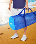 Man holding Heavy Duty Large Mesh Duffle Bag For Gym And Travel Dry Bag For Scuba Gear And Snorkeling Water Sports Tote With Zipper