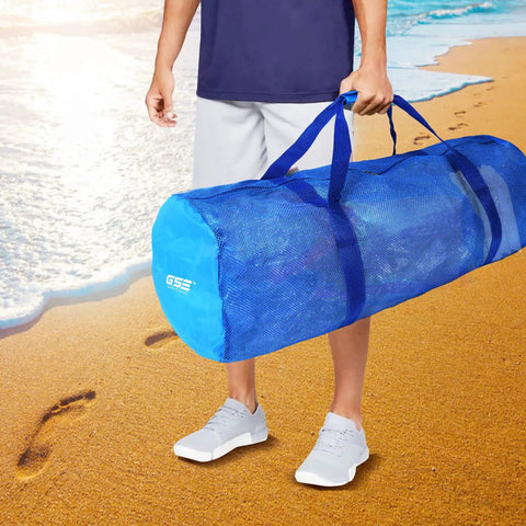 Man holding Heavy Duty Large Mesh Duffle Bag For Gym And Travel Dry Bag For Scuba Gear And Snorkeling Water Sports Tote With Zipper