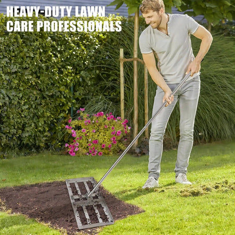 Man using 48 Inch By 10 Inch Stainless Steel Lawn Leveling Rake With 180 Degree Rotating Head And 6 Ft Handle on lawn