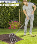Man using 36 Inch Lawn Leveling Rack With Adjustable 72 Inch Handle Stainless Steel Leaf Rack to level garden soil.