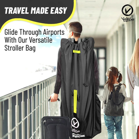 Person carrying Extra Large Stroller Travel Bag With Padded Backpack Straps For Air Travel in airport