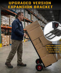 Person using Beefy Heavy Duty Hand Truck With 600 Lb Capacity Steel Construction Two Wheel Dolly in a warehouse