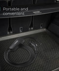 Level 1 And Level 2 Portable EV Charger With Dual Plugs NEMA 5-15 And NEMA 14-50, shown in car trunk for travel