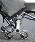 2X Triangle Caster Wheels For Folding Shopping Carts And Dollies attached to a cart, showcasing ease of mobility and stability.