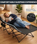 Oversized XXL Folding Camping Cot With Carry Bag Tough As Nails Heavy Duty shown with person lying on durable Oxford fabric.