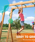 Child swinging on 21 Inch Monkey Bars Kit Playground Rungs For Backyard And Indoor Outdoor Use 12 Pcs Metal Monkey Bars Set