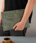 Person holding PU Leather A4 File Folder Waterproof Document Holder With Snap Closure Army Green for office and travel