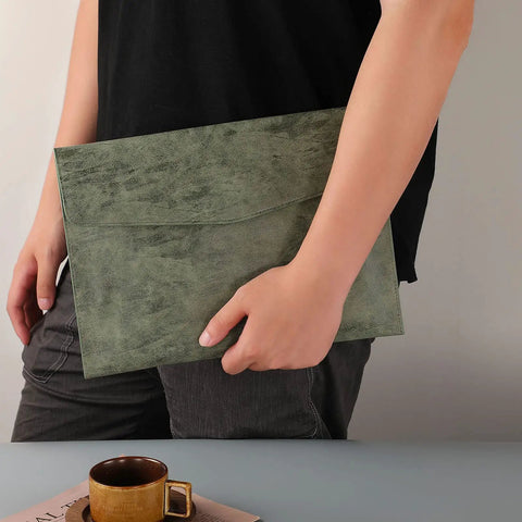 Person holding PU Leather A4 File Folder Waterproof Document Holder With Snap Closure Army Green for office and travel