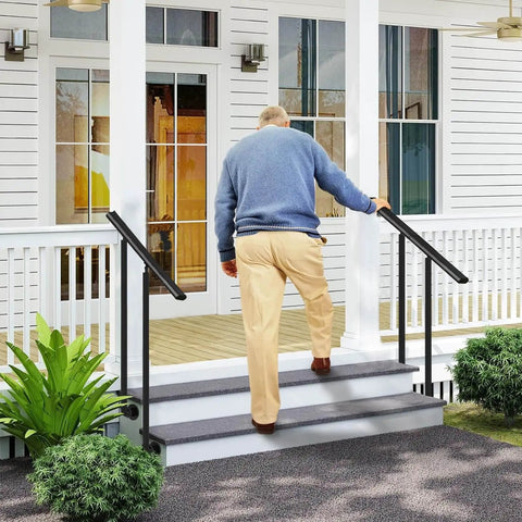 Man using Tough As Nails Wrought Iron Step Railing With Heavy Duty Balusters For Outdoor Decks And Backyards.