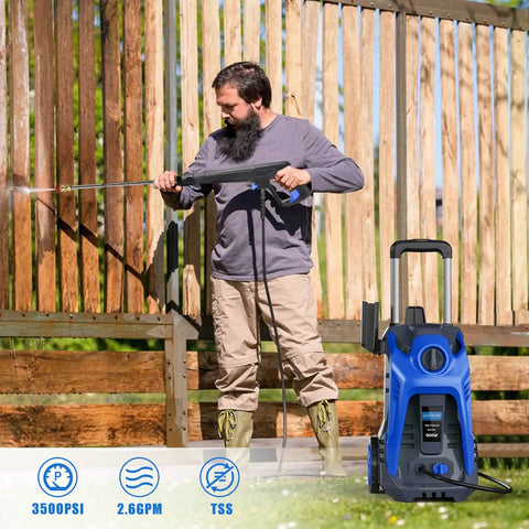 Man using Electric High Pressure Washer 3500 PSI 2.6 GPM with 25 ft hose and reel to clean a wooden fence outdoors.
