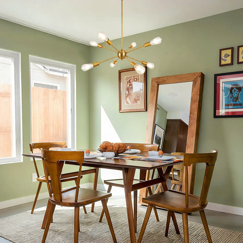 Gold Sputnik Light Fixture With 8 Lights, Modern Brass Chandelier in dining room setting with wood table and chairs