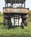 Tow Behind ATV UTV Spot Sprayer With 25 Gallon Dual Water And Concentrate Tanks, 12V Pump on grass with vehicle