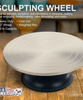 US Art Supply 12-inch metal sculpting wheel on a black turntable base on a wooden table