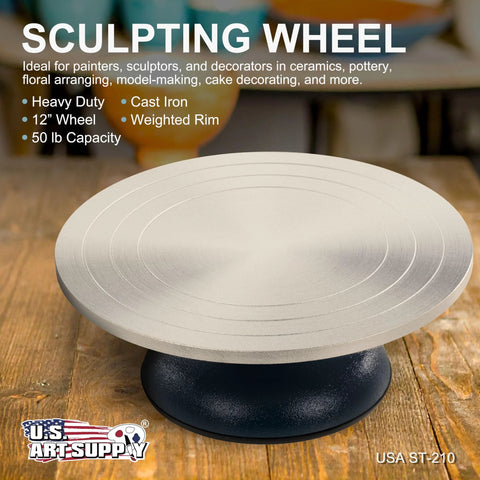 US Art Supply 12-inch metal sculpting wheel on a black turntable base on a wooden table
